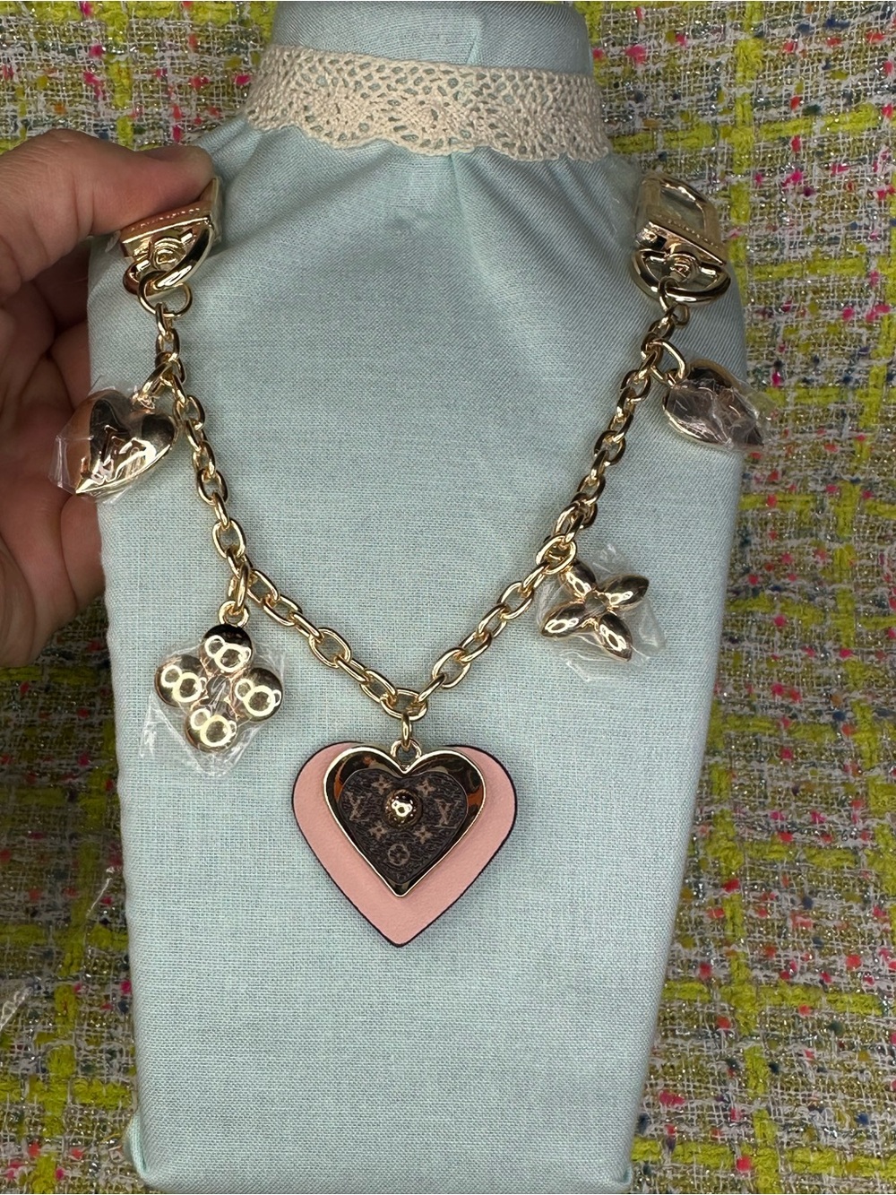 A great Gold-Tone Pink Heart Charm with Logo Motif